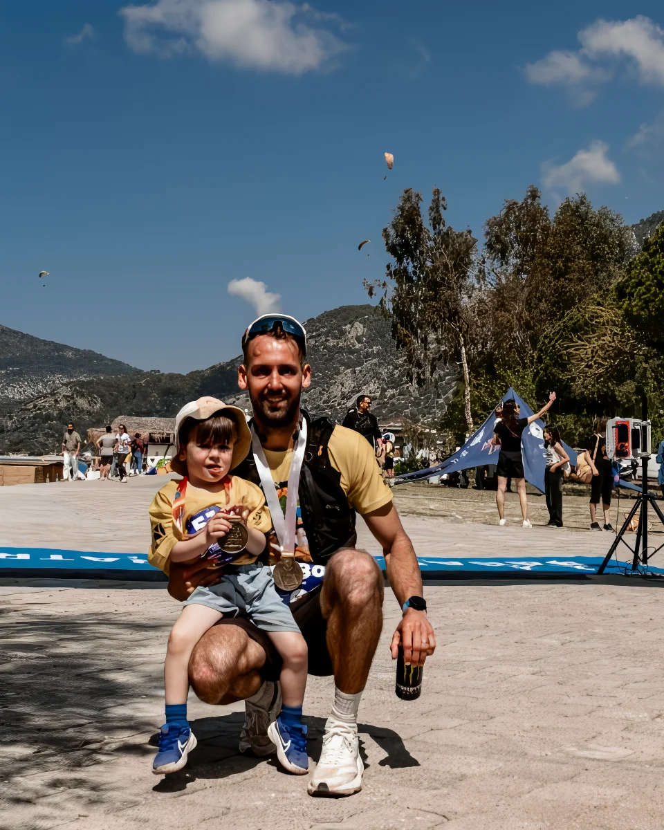 Joe Stone with his son after a running event